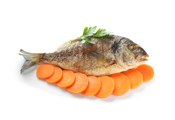 Grilled dorado fish with carrot on white background