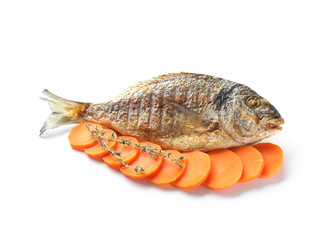 Grilled dorado fish with carrot on white background