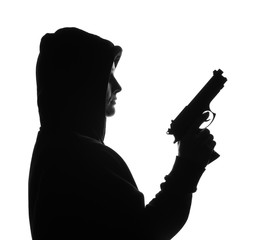 Silhouette of woman with gun on white background