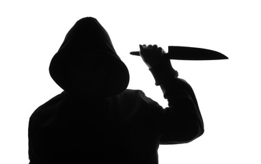 Silhouette of villain with sharp knife on white background