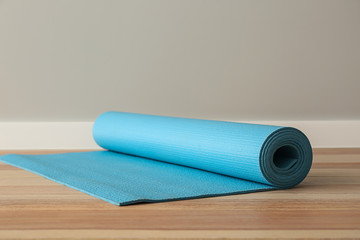 Yoga mat on floor in gym