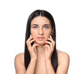 Portrait of beautiful young woman with natural makeup on white background