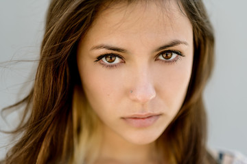 Obraz premium Portrait of young beautiful woman. Shallow depth of field.