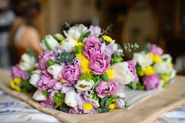 Bridal bouquet, reflection in the mirror, white and pink tulips