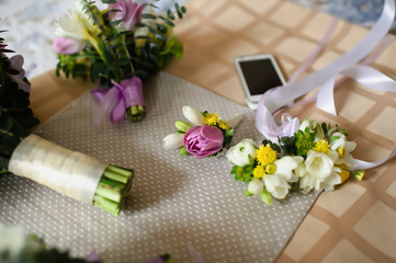 Obraz na płótnie Canvas Bridal bouquet, bridesmaid bouquet, groom's boutonniere