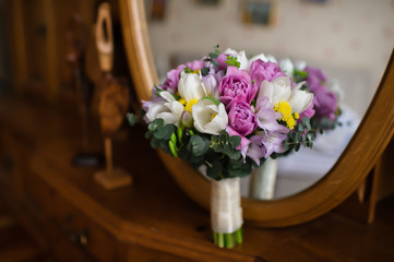 Bridal bouquet, reflection in the mirror, white and pink tulips