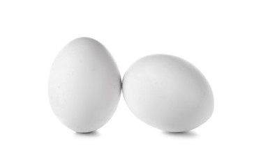 Fresh raw eggs on white background
