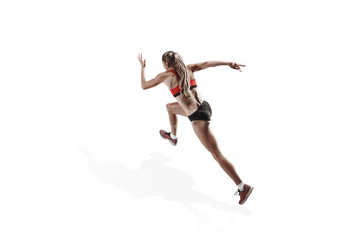 Fototapeta na wymiar The one caucasian female silhouette of runner running and jumping on white studio background. The sprinter, jogger, exercise, workout, fitness, training, jogging concept. Back view