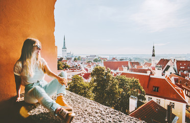 Woman sightseeing Tallinn city landmarks  vacations in Estonia travel lifestyle girl tourist...
