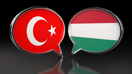Turkey and Hungary flags with Speech Bubbles. 3D illustration