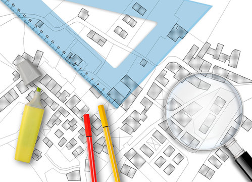 3D rendering of colored work tool over a cadastral map of territory with buildings, fields and roads - concept image
