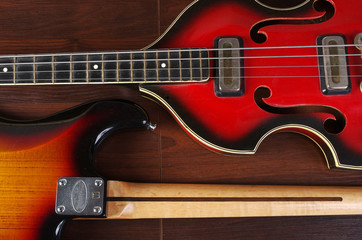 Fototapeta na wymiar Two electric guitars on a wooden table