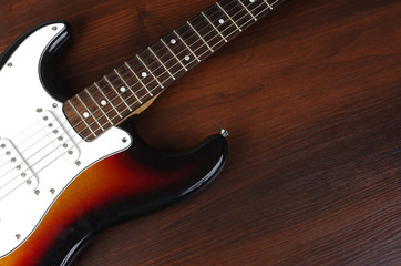 Fototapeta na wymiar Electric guitar on a wooden table