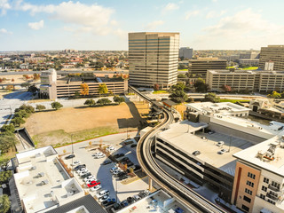 Aerial view downtown Las Colinas, Irving, Texas and light rail system (Area Personal Transit, APT)....