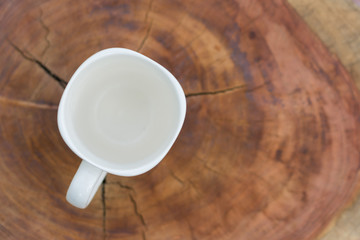 Coffee espresso on wood table nature background in garden,warm tone