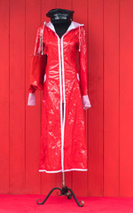 red fashion coat on mannequin