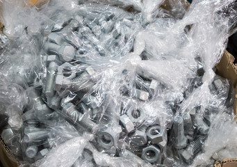 New nuts and bolts in the plastic bag.