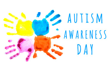 Four colorful child's handprints isolated on white. World autism awareness day concept.