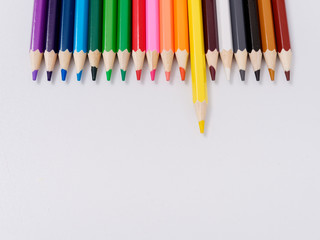 colored pencils sharpened on a white background.
