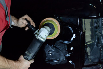 The polisher polishes the body of the vehicle with special wax to protect the car from minor...
