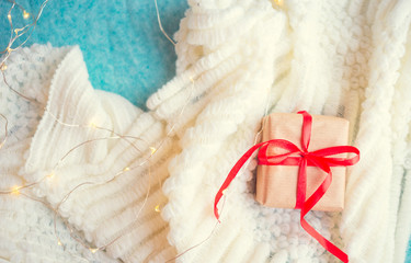 Gift in craft paper with a red ribbon for Valentine's Day, Mother's Day or Christmas
