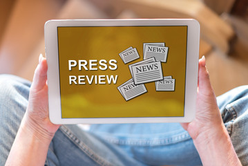 Press review concept on a tablet
