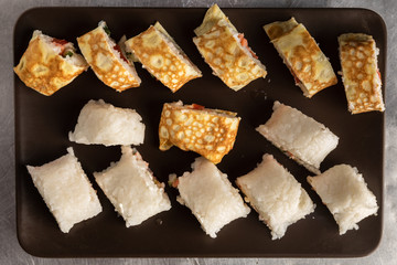 rice roll on a plate. view from above. top view