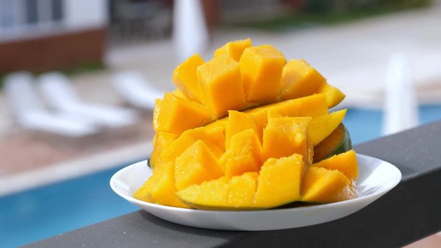 Half cutted cubes slices ripe mango, nobody