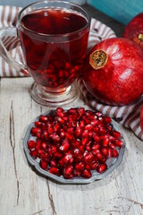 Fresh, ripe pomegranate and juice
