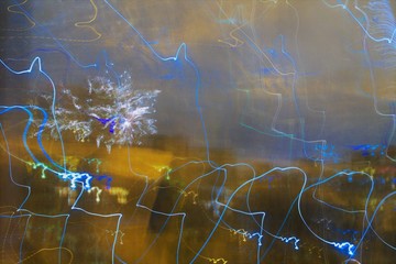New Year's fireworks, shot at a long shutter speed. Background logging. 