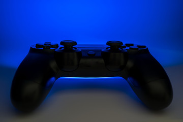 Video game controller with blue light emitting
