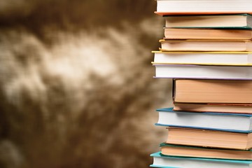 Old Books stacked on background.