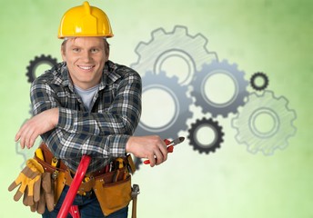Construction worker with tools in empty building