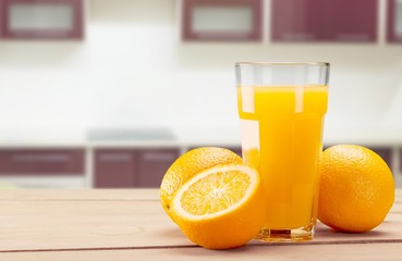 Orange juice and slices of orange on background © BillionPhotos.com
