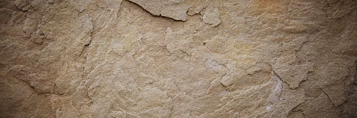 Fotobehang Getextureerde stenen zandsteen oppervlak. Afbeelding close-up © shyshka