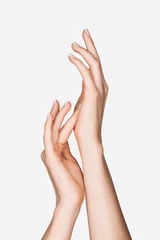 Poster cropped view of female hands isolated on white © LIGHTFIELD STUDIOS