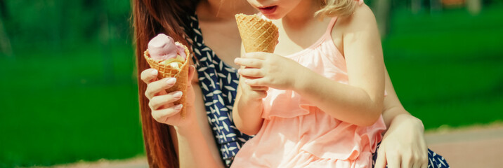 mother with baby eating ice cream close up
