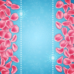 Pink rose petals on blue background. Design element for Valentines Day card or invitation