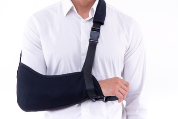 broken hand wearing an arm brace