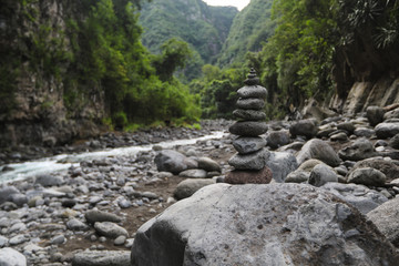 In the mountainous area near the creek a pyramid of various stones was built