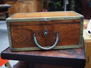 Flea market. Wooden suitcase.
