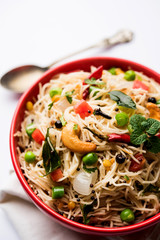 Spicy semiya uppma or upma served in plate. selective focus