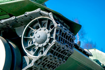 Photo of caterpillars of a military tank