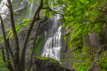 Khlong Lan Waterfall, the beautiful waterfall in deep forest at Khlong Lan National Park ,Kamphaeng Phet, Thailand,