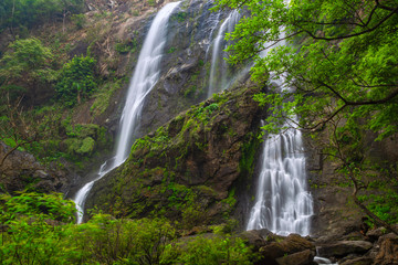 Fototapeta premium Khlong Lan Waterfall, the beautiful waterfall in deep forest at Khlong Lan National Park ,Kamphaeng Phet, Thailand