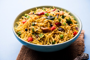 Spicy semiya uppma or upma served in plate. selective focus