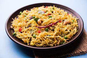 Spicy semiya uppma or upma served in plate. selective focus