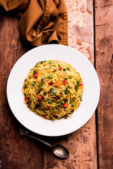 Spicy semiya uppma or upma served in plate. selective focus