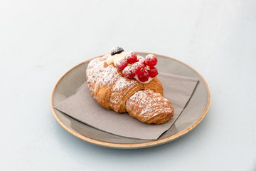 Creamy croissant with berries