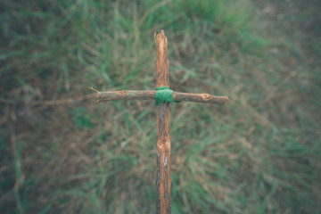 The cross with nature in the forest on the hill is the Blackground.